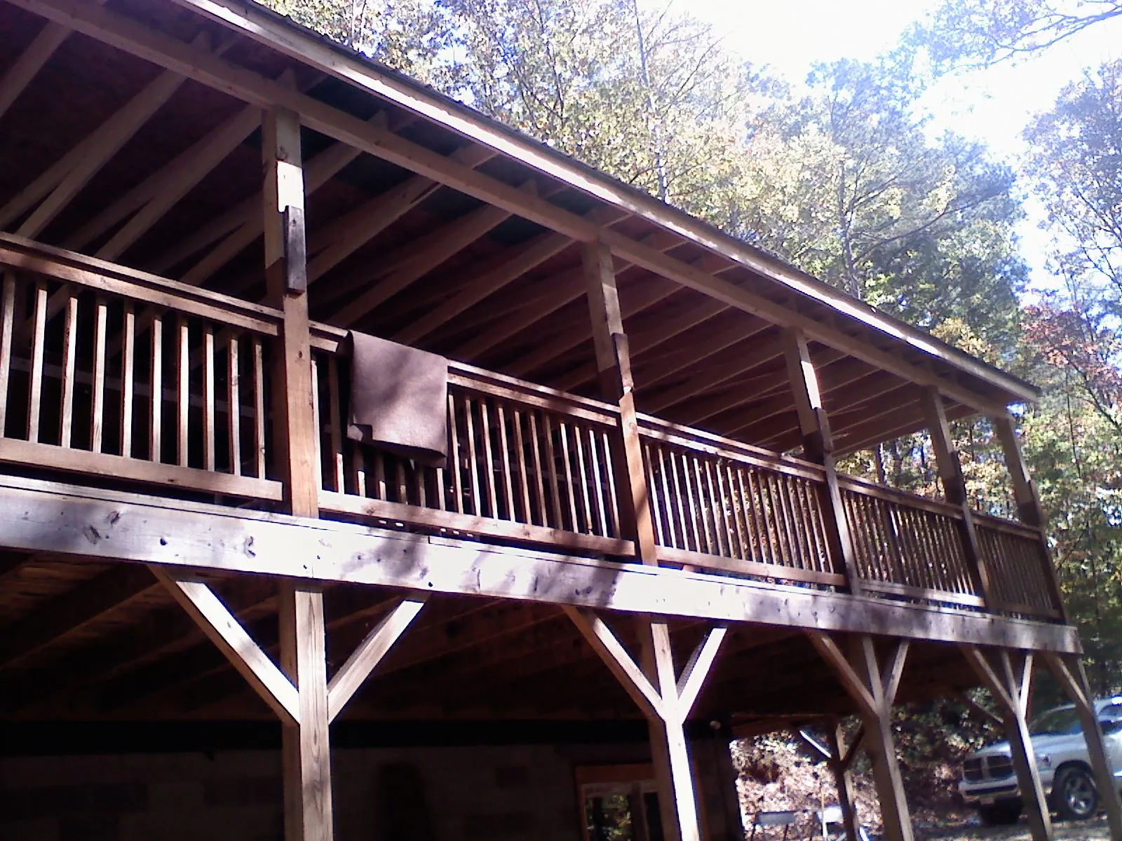 Timber framing under a new elevated porch and deck — Roof Leak Repair in Hagarville by Roofing Brothers